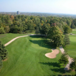 Trees surround a golf course in an aerial view of Tyandaga Golf Course in Burlington.